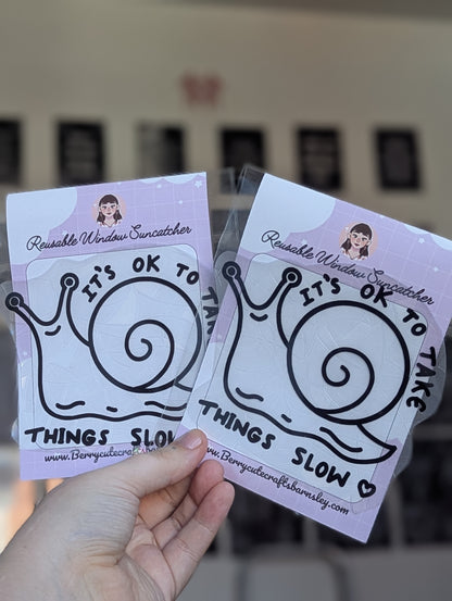Take things slow snail blk suncatcher
