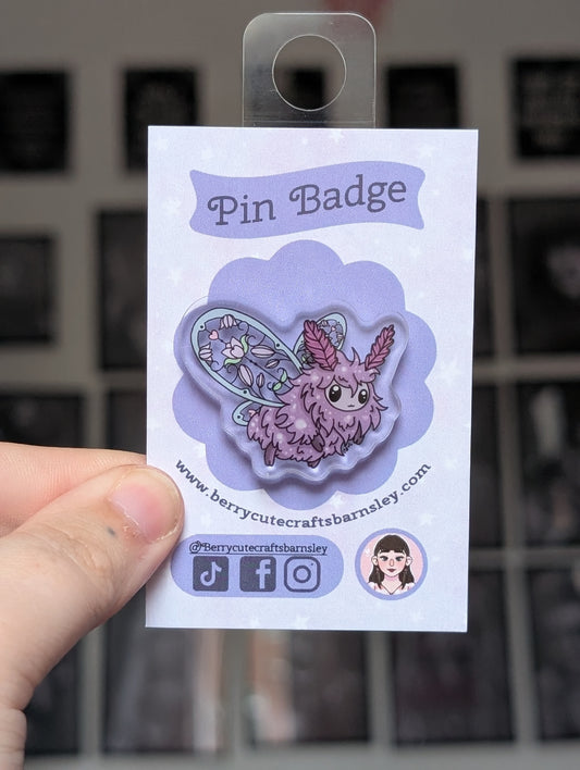 Fluffy moth purple pin badge